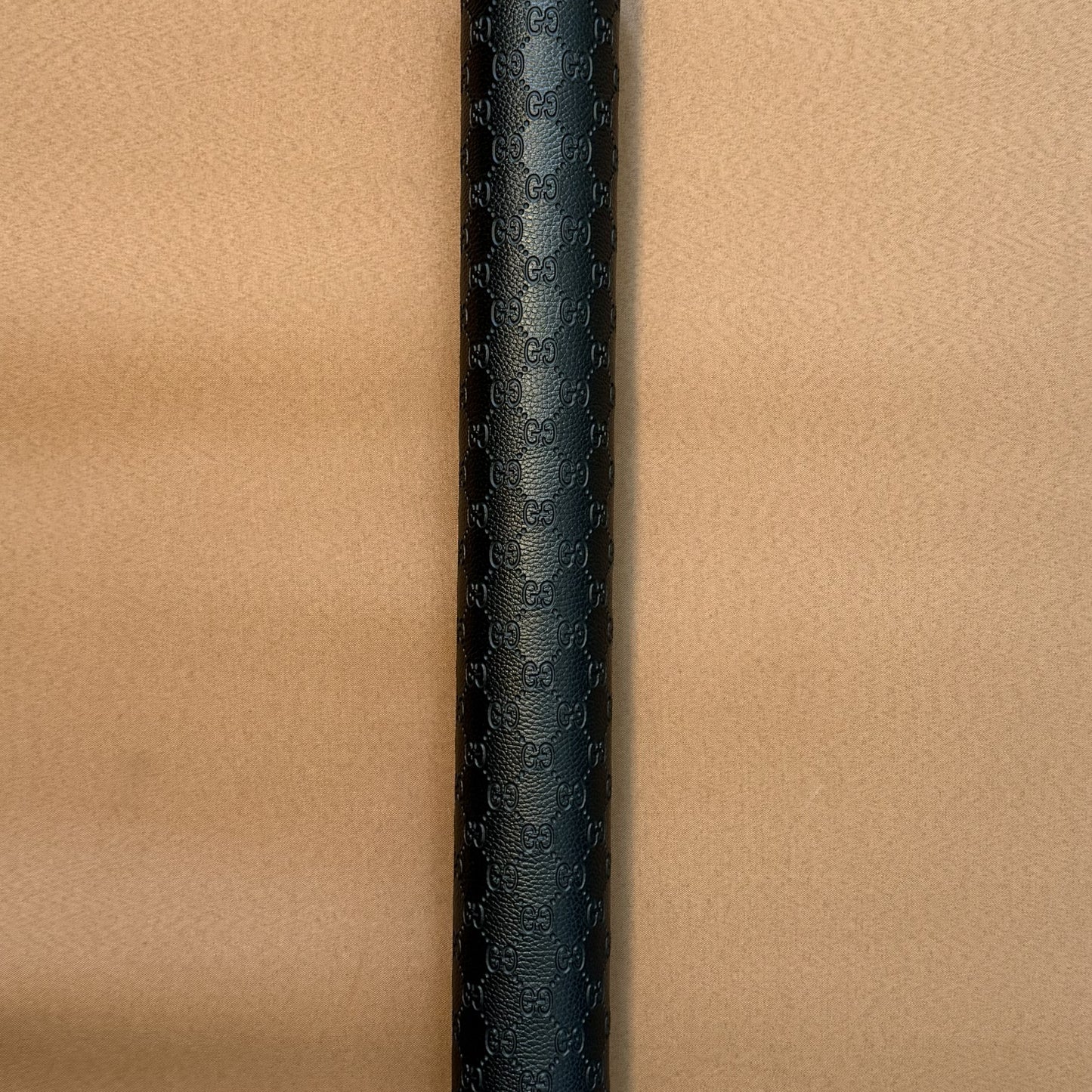 INWARD EMBOSSED LOGO LEATHER